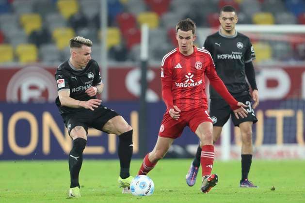 Felix Klaus SpVgg Greuther Fürth and Giovanni Haag Fortuna Duesseldorf battle for the ball during the 2 Bundesliga match between Fortuna Düsseldorf and SpVgg Greuther Fürth at Merkur Spiel Arena on February 28, 2025 in Düsseldorf, Germany, Germany Photo by Oliver Kaelke DeFodi Images Felix Klaus SpVgg Greuther Fürth and Giovanni Haag Fortuna Duesseldorf battle for the ball during the 2 Bundesliga match between Fortuna Düsseldorf and SpVgg Greuther Fürth at Merkur Spiel Arena on February 28, 2025 in Düsseldorf, Germany Photo by Oliver Kaelke DeFodi Images DFB DFL REGULATIONS PROHIBIT ANY USE OF PHOTOGRAPHS AS IMAGE SEQUENCES AND OR QUASI VIDEO Photo by Oliver Kaelke DeFodi Images