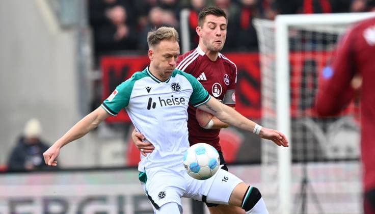 01 03 2025 Soccer season 2024 2025 2 Soccer Bundesliga 24 Matchday 1 FC Nürnberg FCN Club Hannover 96 H96 Sportfoto Zink xwoxzix DFL regulations prohibit any use of photographs as image sequences and or quasi video only for editorial use Havard Nielsen 16, Hannover 96 H96 before Robin Knoche 31, 1 FC Nürnberg FCN