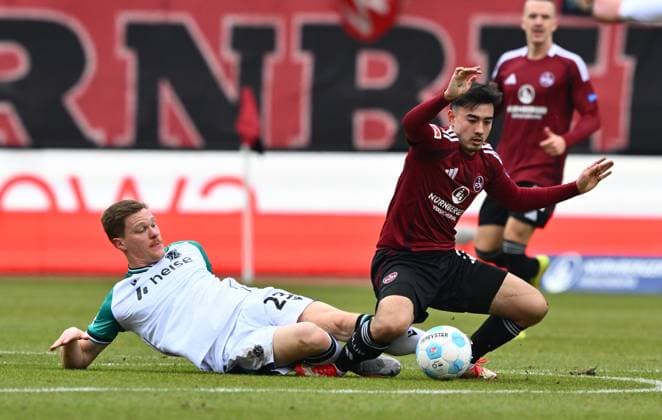 01 03 2025 Soccer Season 2024 2025 2 Soccer Bundesliga 24 Matchday 1 FC Nürnberg FCN Club Hannover 96 H96 Sportfoto Zink xwoxzix DFL regulations prohibit any use of photographs as image sequences and or quasi video only for editorial use Marcel Halstenberg 23, Hannover 96 H96 Jens Castrop 17, 1 FC Nürnberg FCN