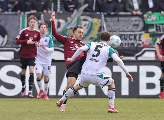 01 03 2025 Soccer Season 2024 2025 2 Soccer Bundesliga 24 Matchday 1 FC Nürnberg FCN Club Hannover 96 H96 Sportfoto Zink DaMa xdaxmax DFL regulations prohibit any use of photographs as image sequences and or quasi video only for editorial use Julian Justvan 10, 1 FC Nürnberg FCN Phil Neumann 5, Hannover 96 H96