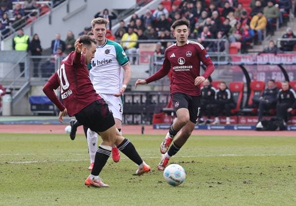 01 03 2025 Soccer season 2024 2025 2 Soccer Bundesliga 24 Matchday 1 FC Nürnberg FCN Club Hannover 96 H96 Sportfoto Zink DaMa xdaxmax DFL regulations prohibit any use of photographs as image sequences and or quasi video only for editorial use Julian Justvan 10, 1 FC Nürnberg FCN with shot on goal