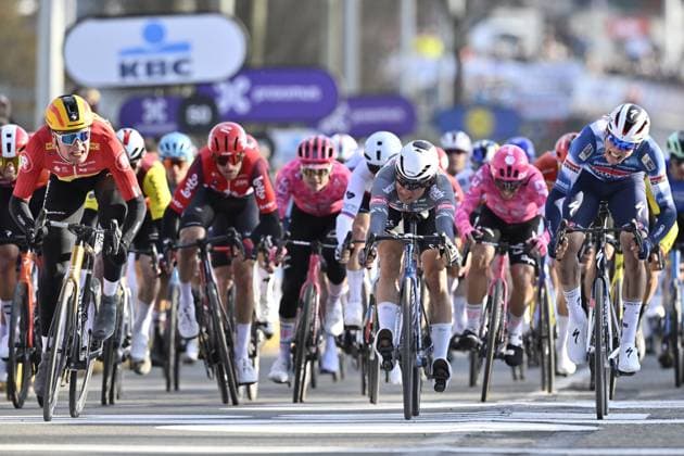 Norwegian Soren Waerenskjold of Uno-X Mobility, Belgian Jasper Philipsen of Alpecin-Deceuninck and French Paul Magnier of Soudal Quick-Step sprint to the finish of the men s one-day cycling race Omloop Het Nieuwsblad (UCI World Tour), 197km from Gent to Ninove, Saturday 01 March 2025. DIRKxWAEM  x113849424x
