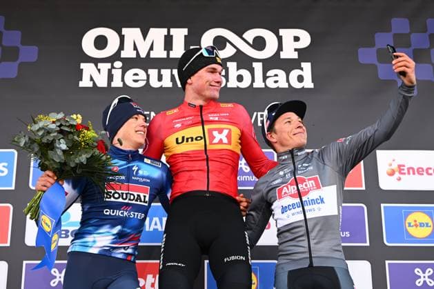 Omloop Het Nieuwsblad 2025 Cycling Race Ninove, Belgium - March 01 : Waerenskjold Søren (NOR) of Uno-X Mobility, Philipsen Jasper (BEL) of Alpecin-Deceuninck, Magnier Paul (FRA) of Soudal - Quick Step on the podium during the Men Elite UCI World Tour 80th Flanders Classics Omloop Het Nieuwsblad cycling race of 197 kms with start in Ghent and finish in Ninove on March 1, 2025 in Ninove, Belgium, 1 03 2025 ( Motordriver Kenny Verfaillie - Ninove Belgium  Copyright: xVincentxKalutx