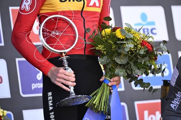 Norwegian Soren Waerenskjold of Uno-X Mobility celebrates on the podium after winning the men s one-day cycling race Omloop Het Nieuwsblad (UCI World Tour), 197 km from Gent to Ninove, Saturday 01 March 2025. JASPERxJACOBS  x113854150x
