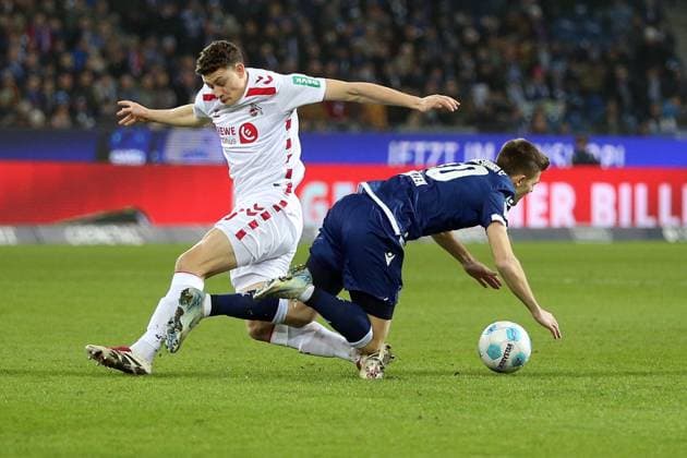 01 03 2025, xrekx, Fußball 2 Bundesliga, Karlsruher SC 1 FC Köln v l Eric Martel 1 FC Koeln Marvin Wanitzek Karlsruher SC Zweikampf, Aktion, action, battle for the ball DFL DFB REGULATIONS PROHIBIT ANY USE OF PHOTOGRAPHS as IMAGE SEQUENCES and or QUASI VIDEO Karlsruhe