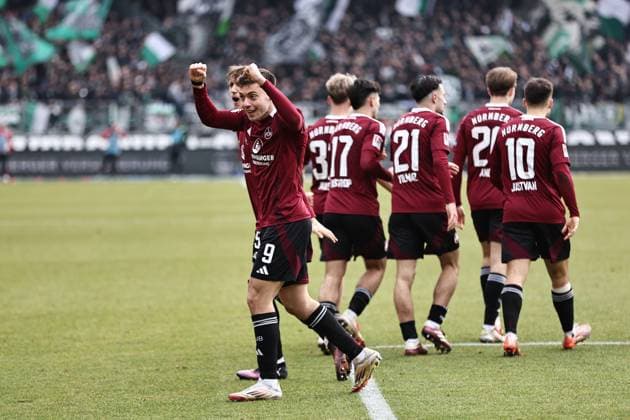 Stefanos Tzimas and other players of 1 FCN are happy about the later disallowed goal in the second round match of the 2024 2025 season between 1 FC Nuremberg and Hannover 96 1 2 in Nuremberg 01 03 2025