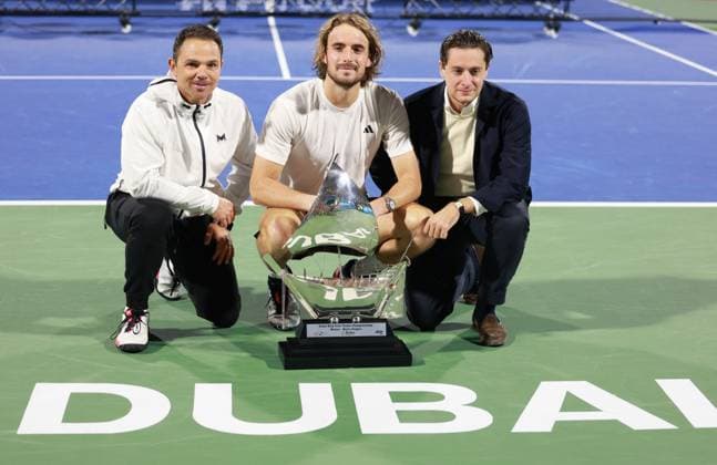 Winner Stefanos Tsitsipas with cup, trophy and team, left trainer, coach Dimitris Chatzinikolaou, right Alessandro Pirounis, award ceremony, Presentation, Dubai Duty Free Tennis Championships, Dubai, U A E Copyright: xJuergenxHasenkopfx