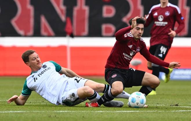 01 03 2025 Soccer Season 2024 2025 2 Soccer Bundesliga 24 Matchday 1 FC Nürnberg FCN Club Hannover 96 H96 Sportfoto Zink xwoxzix DFL regulations prohibit any use of photographs as image sequences and or quasi video only for editorial use Marcel Halstenberg 23, Hannover 96 H96 Jens Castrop 17, 1 FC Nürnberg FCN