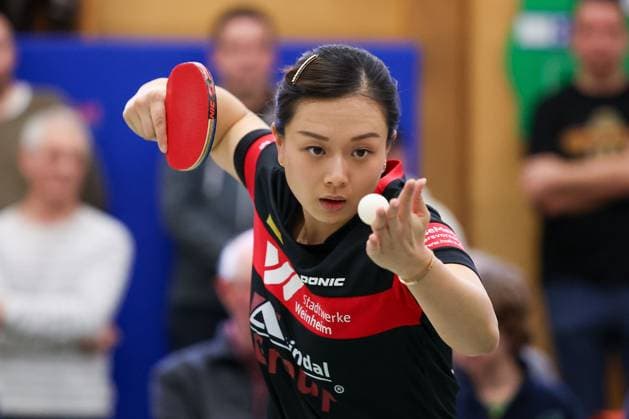 2025 03 01 Table tennis women 1 Bundesliga TSV 1909 Langstadt TTC 1946 Weinheim v l , Yuan Wan TTC 1946 Weinheim Table tennis women 1 Bundesliga concentrated, makes a serve Copyright: JoaquimxFerreira