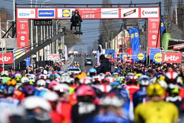 Kuurne - Brussel - Kuurne 2025 cycling race KUURNE, BELGIUM - MARCH 02 : Illustration picture peloton passing the finish during the Men Elite UCI 1.Pro 77th Kuurne - Brussel - Kuurne cycling race of 203 kms with start in Kortrijk and finish in Kuurne on March 02, 2025 in Kuurne, Belgium, 02 03 2025 ( Motordriver Kenny Verfaillie & Kuurne Belgium  Copyright: xTomasxSiskx