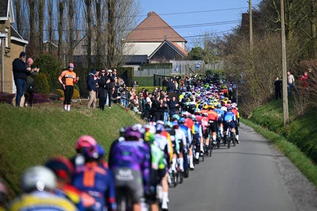 Kuurne - Brussel - Kuurne 2025 cycling race KUURNE, BELGIUM - MARCH 02 : Illustration picture of the peloton and fans during the Men Elite UCI 1.Pro 77th Kuurne - Brussel - Kuurne cycling race of 203 kms with start in Kortrijk and finish in Kuurne on March 02, 2025 in Kuurne, Belgium, 02 03 2025 ( Motordriver Kenny Verfaillie & Kuurne Belgium  Copyright: xTomasxSiskx