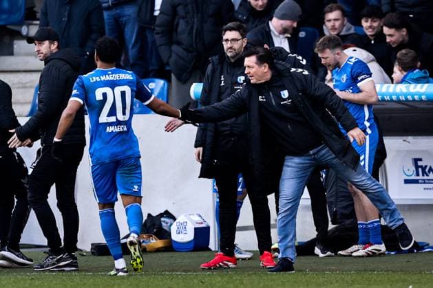 Goal celebration Goalscorer Xavier Amaechi 1 FC Magdeburg,20 scores to 1 1 with coach Christian Titz 1 FC Magdeburg 2 Soccer Bundesliga Season 2024 2025 1 FC Magdeburg vs SV Darmstadt 98 at the Avnet Arena in Magdeburg Action,Soccer,Man,Men,Germany,02 03 2025