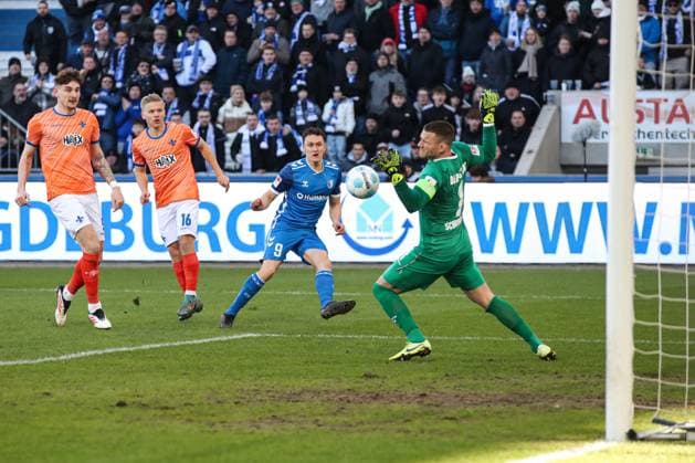 Martijn Kaars 1 FC Magdeburg,9 vs Goalkeeper Marcel Schuhen SV Darmstadt 98,1 2 Soccer Bundesliga Season 2024 2025 1 FC Magdeburg vs SV Darmstadt 98 at the Avnet Arena in Magdeburg Action,Soccer,Man,Men,Germany,02 03 2025