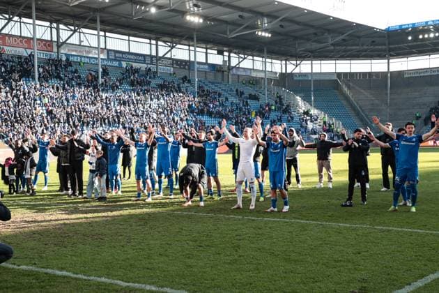 The team of 1 FC Magdeburg celebrates the victory in front of the fan block 2 Soccer Bundesliga season 2024 2025 1 FC Magdeburg vs SV Darmstadt 98 at the Avnet Arena in Magdeburg Action,Soccer,Man,Men,Germany,02 03 2025