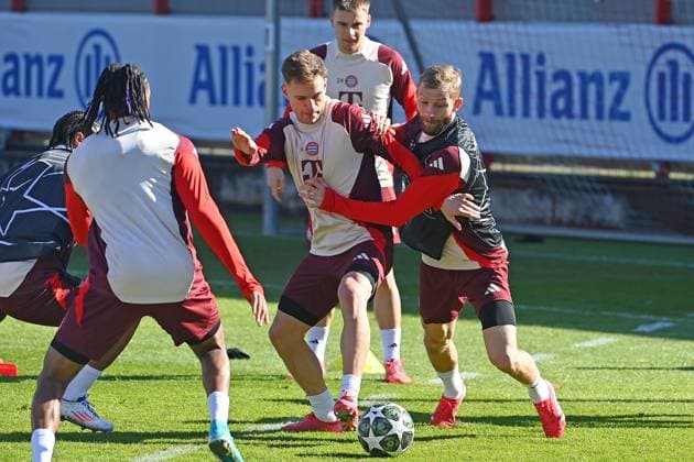 Joshua KIMMICH Bayern Muenchen , action,duel against Konrad LAIMER Bayern Muenchen , final training on 04 03 2025 Soccer Champions League Round of 16 FC Bayern Muenchen Bayer 04 Leverkusen on 05 03 2025 , A L L I A N Z A R E N A