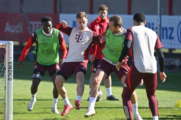 Joshua KIMMICH Bayern Muenchen , action, duel against Harry KANE Bayern Muenchen Li Alphonso DAVIES Bayern Muenchen , final training on 04 03 2025 Football Champions League round of 16 FC Bayern Muenchen Bayer 04 Leverkusen on 05 03 2025 , A L L I A N Z A R E N A