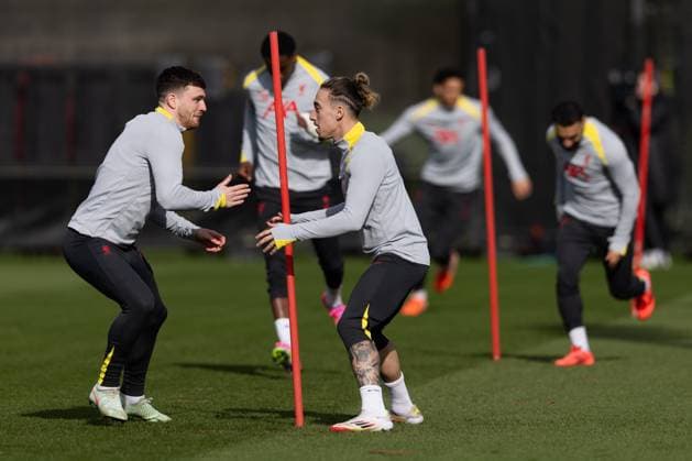 Football - UEFA Champions League - Round of 16 1st Leg - Paris Saint-Germain v Liverpool FC - MD-1 LIVERPOOL, ENGLAND - Tuesday, March 4, 2025: Liverpool s Andy Robertson (L) and Kostas Tsimikas during a training session at the AXA Training Centre ahead of the UEFA Champions League match between Paris Saint-Germain and Liverpool FC. (Photo by Jessica Hornby Propaganda) LIVERPOOL AXA Training Centre MERSEYSIDE ENGLAND  Copyright: xDavidxRawcliffex P2025-03-04-JH_LFC_Training_PSG-17