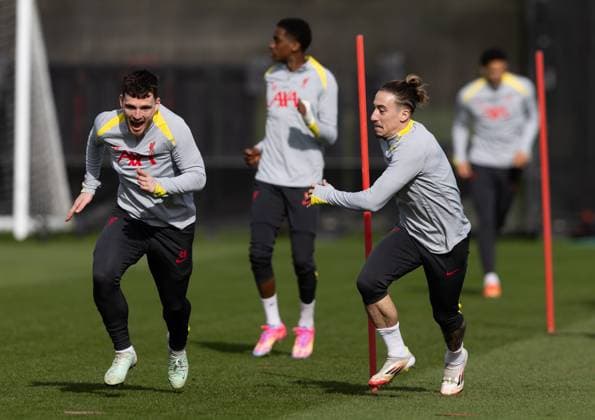 Football - UEFA Champions League - Round of 16 1st Leg - Paris Saint-Germain v Liverpool FC - MD-1 LIVERPOOL, ENGLAND - Tuesday, March 4, 2025: Liverpool s Andy Robertson (L) and Kostas Tsimikas during a training session at the AXA Training Centre ahead of the UEFA Champions League match between Paris Saint-Germain and Liverpool FC. (Photo by Jessica Hornby Propaganda) LIVERPOOL AXA Training Centre MERSEYSIDE ENGLAND  Copyright: xDavidxRawcliffex P2025-03-04-JH_LFC_Training_PSG-19