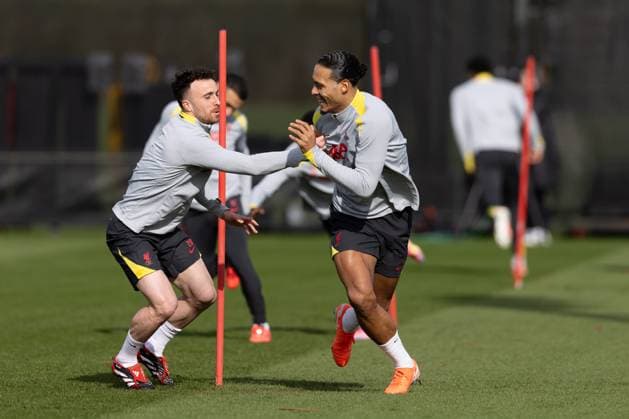 Football - UEFA Champions League - Round of 16 1st Leg - Paris Saint-Germain v Liverpool FC - MD-1 LIVERPOOL, ENGLAND - Tuesday, March 4, 2025: Liverpool s Diogo Jota (L) and captain Virgil van Dijk during a training session at the AXA Training Centre ahead of the UEFA Champions League match between Paris Saint-Germain and Liverpool FC. (Photo by Jessica Hornby Propaganda) LIVERPOOL AXA Training Centre MERSEYSIDE ENGLAND  Copyright: xDavidxRawcliffex P2025-03-04-JH_LFC_Training_PSG-23