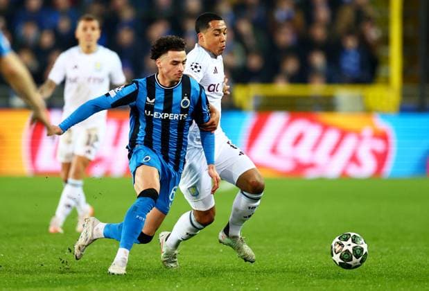 Youri Tielemans of Aston Villa and Chemsdine Talbi of Club Brugge. Club Brugge v Aston Villa, UEFA Champions League, Round of 16, First Leg, Football, Jan Breydel Stadium, Brugge, Belgium - 04 Mar 2025 EDITORIAL USE ONLY No use with unauthorised audio, video, data, fixture lists, club league logos or live services. Online in-match use limited to 120 images, no video emulation. No use in betting, games or single club league player publications. Copyright: xJamesxMarsh Shutterstockx 15176976aw
