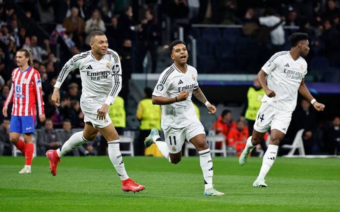 Rodrygo of Real Madrid celebrates scoring the opening goal Real Madrid v Atletico Madrid , UEFA Champions League, Round of 16, First Leg, Football, Santiago Bernabeu, Madrid, Spain - 04 Mar 2025 EDITORIAL USE ONLY No use with unauthorised audio, video, data, fixture lists, club league logos or live services. Online in-match use limited to 120 images, no video emulation. No use in betting, games or single club league player publications. Copyright: xRubenxAlbarran Shutterstockx 15178301ad