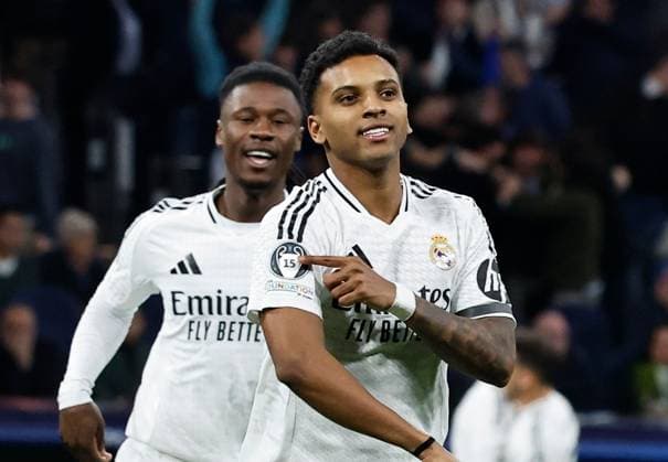 Rodrygo of Real Madrid celebrates scoring the opening goal Real Madrid v Atletico Madrid , UEFA Champions League, Round of 16, First Leg, Football, Santiago Bernabeu, Madrid, Spain - 04 Mar 2025 EDITORIAL USE ONLY No use with unauthorised audio, video, data, fixture lists, club league logos or live services. Online in-match use limited to 120 images, no video emulation. No use in betting, games or single club league player publications. Copyright: xRubenxAlbarran Shutterstockx 15178301af