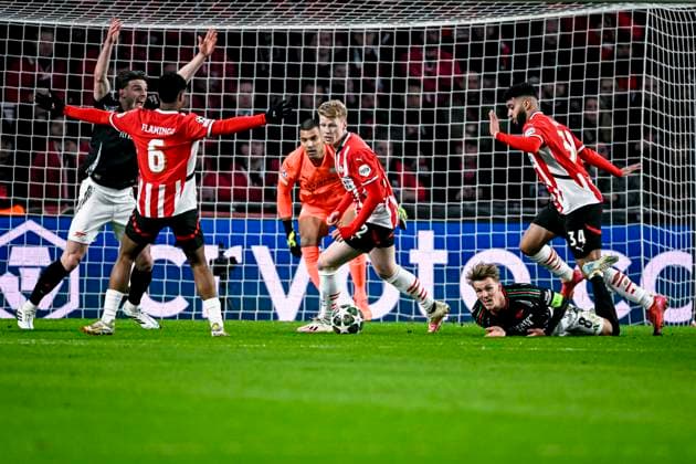 PSV midfielder Jerdy Schouten, Arsenal midfielder Martin Odegaard, PSV midfielder Ismael Saibari, during the match PSV Arsenal at the Philips stadium for the UEFA Champions League Round of 16 1st leg season 2024 2025 in EINDHOVEN, Netherlands on 4 march 2025, photo by Stefan Koops EYE4images DeFodi Images