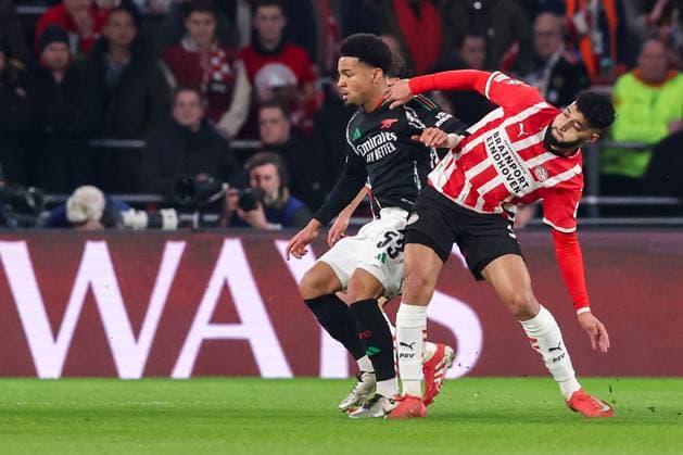 2025-03-04 PSV v Arsenal FC - UEFA Champions League 2024 25 Round of 16 First Leg EINDHOVEN, NETHERLANDS - MARCH 4: Olivier Boscagli of PSV battles for possession with Ethan Nwaneri of Arsenal FC and Ismael Saibari of PSV during the UEFA Champions League 2024 25 Round of 16 First Leg match between PSV and Arsenal FC at PSV Stadion on March 4, 2025 in Eindhoven, Netherlands. Eindhoven PSV Stadion Netherlands Content not available for redistribution in The Netherlands directly or indirectly through any third parties. Copyright: xBenxGalx
