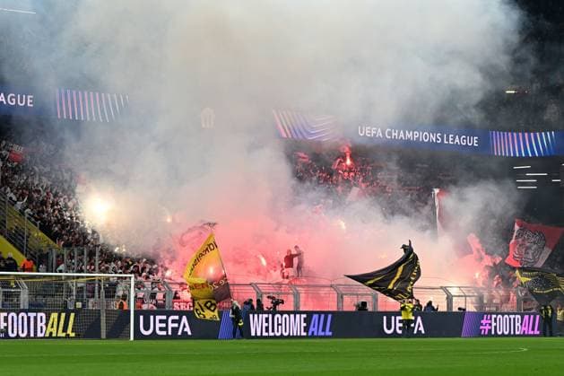 Fans Lille supporters use pyrotechnics during the UEFA Champions League 2024 25 Round of 16 First Leg match between Borussia Dortmund and LOSC Lille at Signal Iduna Park on March 4, 2025 in Dortmund, Germany Photo by Ralf Treese DeFodi Images