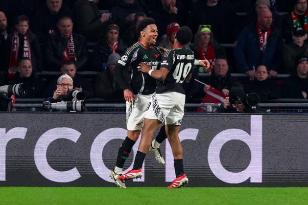 2025-03-04 PSV v Arsenal FC - UEFA Champions League 2024 25 Round of 16 First Leg EINDHOVEN, NETHERLANDS - MARCH 4: Ethan Nwaneri of Arsenal FC celebrates after scoring his teams second goal, Myles Lewis-Skelly of Arsenal FC during the UEFA Champions League 2024 25 Round of 16 First Leg match between PSV and Arsenal FC at PSV Stadion on March 4, 2025 in Eindhoven, Netherlands. Eindhoven PSV Stadion Netherlands Content not available for redistribution in The Netherlands directly or indirectly through any third parties. Copyright: xBenxGalx