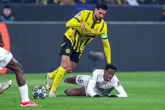 04 03 2025, Football, UEFA Champions League, Borussia Dortmund OSC Lille, Signal Iduna Park, Round of 16, Season 2024 2025 Emre Can BVB 23 in duel against Jonathan David LOSC Lille 9 North Rhine-Westphalia Germany