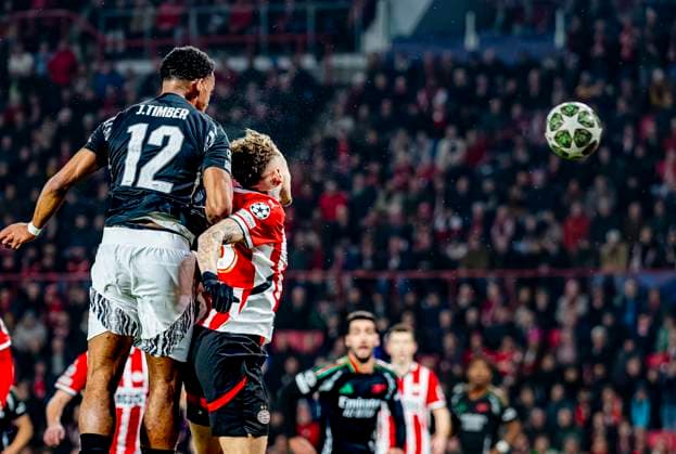 Arsenal defender Jurrien Timber scores the 0 1 during the match PSV Arsenal at the Philips stadium for the UEFA Champions League Round of 16 1st leg season 2024 2025 in EINDHOVEN, Netherlands on 4 march 2025, photo by Marcel van Dorst EYE4images DeFodi Images