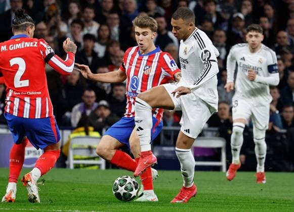 Kylian Mbappà of Real Madrid Real Madrid v Atletico Madrid , UEFA Champions League, Round of 16, First Leg, Football, Santiago Bernabeu, Madrid, Spain - 04 Mar 2025 EDITORIAL USE ONLY No use with unauthorised audio, video, data, fixture lists, club league logos or live services. Online in-match use limited to 120 images, no video emulation. No use in betting, games or single club league player publications. Copyright: xRubenxAlbarran Shutterstockx 15178301ay