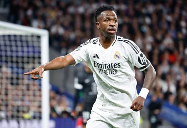 Vinicius Junior of Real Madrid Real Madrid v Atletico Madrid , UEFA Champions League, Round of 16, First Leg, Football, Santiago Bernabeu, Madrid, Spain - 04 Mar 2025 EDITORIAL USE ONLY No use with unauthorised audio, video, data, fixture lists, club league logos or live services. Online in-match use limited to 120 images, no video emulation. No use in betting, games or single club league player publications. Copyright: xRubenxAlbarran Shutterstockx 15178301ba