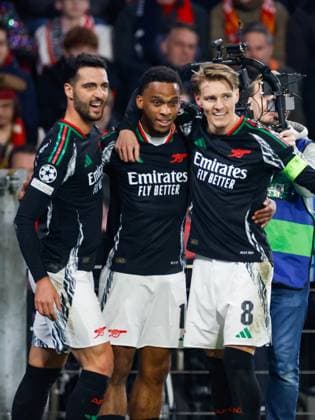 Jurrien Timber Arsenal FC celebrating his first goal with Martin Odegaard Arsenal FC , UEFA Champions League 2024 25 Round of 16 First Leg, PSV Eindhoven v Arsenal FC, Philips Stadion, March 4, 2025, Eindhoven, Netherlands.