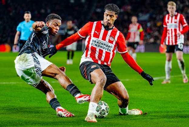 Arsenal defender Jurrien Timber, PSV Eindhoven midfielder Ismael Saibari during the match PSV Arsenal at the Philips stadium for the UEFA Champions League Round of 16 1st leg season 2024 2025 in EINDHOVEN, Netherlands on 4 march 2025, photo by Marcel van Dorst EYE4images DeFodi Images