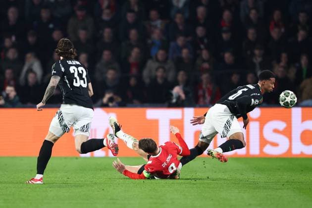 EINDHOVEN, 04-03-2025, Philips Stadium, UEFA Champions League, round of 16 1st leg, season 2024 25, match between PSV and Arsenal, Arsenal player Riccardo Calafiori, PSV player Luuk de Jong, Arsenal player Gabriel PSV - Arsenal  x28168874x Copyright: