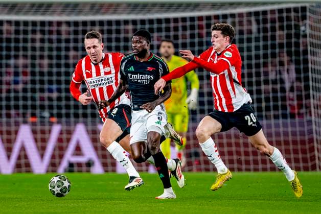 Arsenal midfielder Thomas Partey, PSV Eindhoven midfielder Guus Til during the match PSV Arsenal at the Philips stadium for the UEFA Champions League Round of 16 1st leg season 2024 2025 in EINDHOVEN, Netherlands on 4 march 2025, photo by Marcel van Dorst EYE4images DeFodi Images