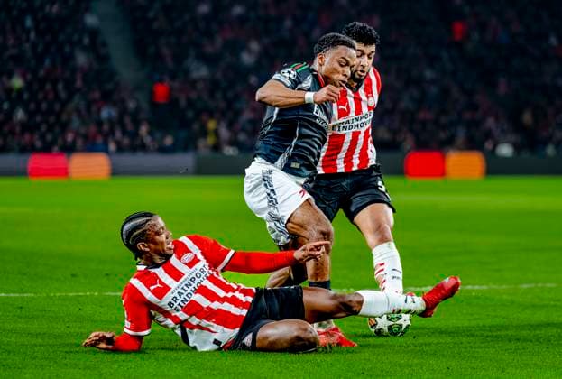PSV Eindhoven defender Tyrell Malacia, Arsenal defender Jurrien Timber, PSV Eindhoven midfielder Ismael Saibari during the match PSV Arsenal at the Philips stadium for the UEFA Champions League Round of 16 1st leg season 2024 2025 in EINDHOVEN, Netherlands on 4 march 2025, photo by Marcel van Dorst EYE4images DeFodi Images