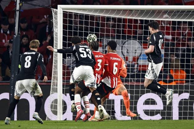 EINDHOVEN - Ethan Nwaneri of Arsenal FC (53) scores the 0-2 during the UEFA Champions league match between PSV Eindhoven and Arsenal FC at Phillips Stadium on March 4, 2025 in Eindhoven, Netherlands. ANP MAURICE VAN STEEN UEFA Champions League 2024 25 Round of 16 First leg 2024 25 xVIxANPxSportx xxANPxIVx 521567874 originalFilename: 521567874.jpg