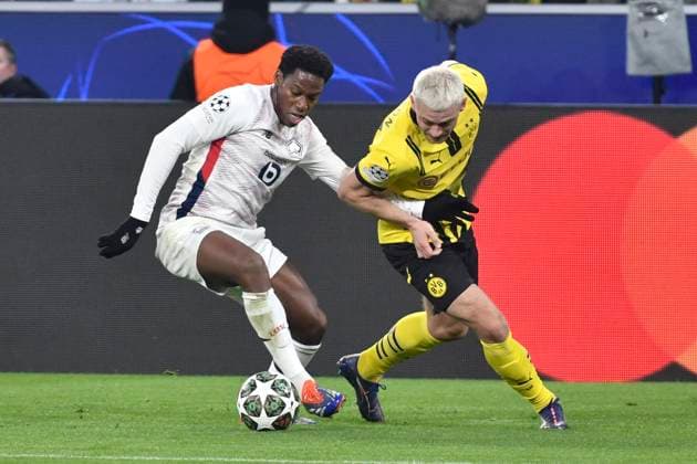 from left in duel Jonathan David Lille OSC 9 Julian Ryerson Dortmund 26 04 03 2025 Soccer, Champions League, Borussia Dortmund vs Lille OSC, Signal Iduna Park, Dortmund, Copyright: xpepphotox xHorstxMauelshagenx pep00321, pep_20250304_hm_7257
