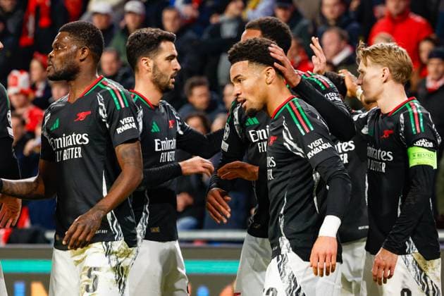Ethan Nwaneri Arsenal FC celebrating the 0-2 with Myles Lewis-Skelly Arsenal FC and Declan Rice Arsenal FC, Martin Odegaard Arsenal FC , UEFA Champions League 2024 25 Round of 16 First Leg, PSV Eindhoven v Arsenal FC, Philips Stadion, March 4, 2025, Eindhoven, Netherlands.