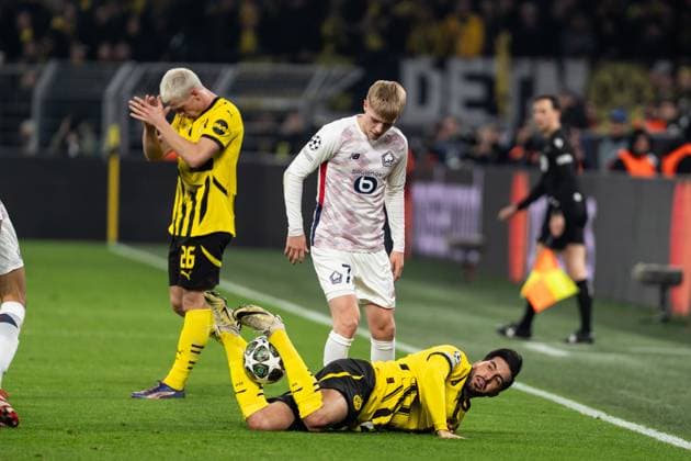 GER, UEFA Champions League, Borussia Dortmund vs OSC Lille 04 03 2025, Signal Iduna Park, Dortmund, GER, UEFA Champions League, Borussia Dortmund vs OSC Lille In the picture Foul on Emre Can BV Borussia Dortmund, 23 Hakon Hakon Arnar Haraldsson OSC Lille, 7 nordphotoxGmbHxx xChristianxSchulze nph000300