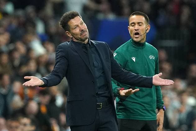 REAL MADRID CF v ATLETICO DE MADRID. CHAMPIONS LEAGUE 2024 2025. ROUND OF 16. 1ST LEG MATCH. Atletico de Madrid s coach Diego Pablo Cholo Simeone has words with the fourth referee during Champions League 2024 2025 Round of 16 1st leg match. March 4,2025. (ALTERPHOTOS Acero) MadridSpain  Copyright: xAcerox
