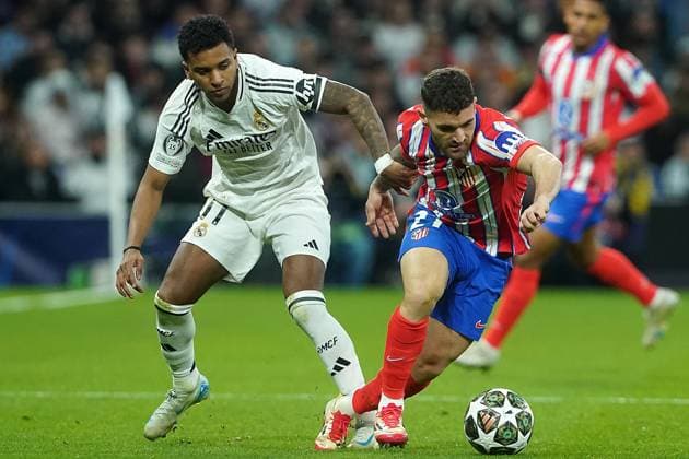 REAL MADRID CF v ATLETICO DE MADRID. CHAMPIONS LEAGUE 2024 2025. ROUND OF 16. 1ST LEG MATCH. Real Madrid CF s Rodrygo Goes (l) and Atletico de Madrid s Javi Galan during Champions League 2024 2025 Round of 16 1st leg match. March 4,2025. (ALTERPHOTOS Acero) MadridSpain  Copyright: xAcerox