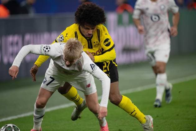 Karim David ADEYEMI DO vs Hakon HARALDSSON LOSC Action, duel, Football Champions League, Round of 16, Round of 16, Borussia Dortmund DO OSC Lille LOSC on 04 03 2025 in Dortmund Germany UEFA regulations prohibit any use of photographs as image sequences and or quasi video Â