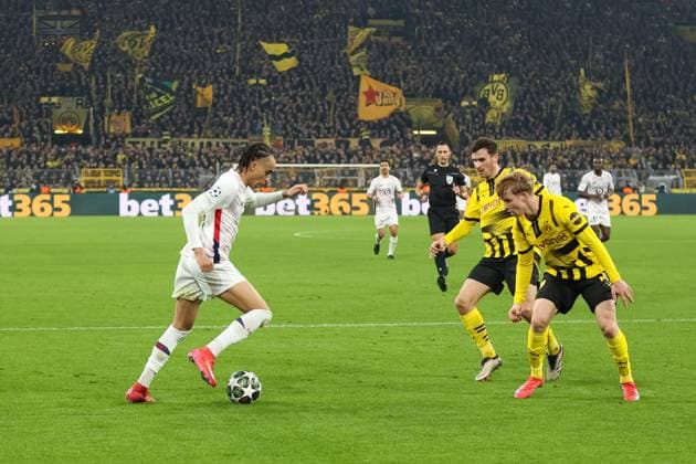 Ethan Mbappe LOSC Lille, 29 and Daniel Svensson Borussia Dortmund, 24 GER, Borussia Dortmund vs LOSC Lille, Football, Champions League, Round of 16, 2024 2025 season, 04 03 2025 GER, Borussia Dortmund vs LOSC Lille, Football, Champions League, Round of 16, 2024 2025 season, 04 03 2025 Dortmund Copyright: xEibner-Pressefoto FrankxZeisingx EP_FZG