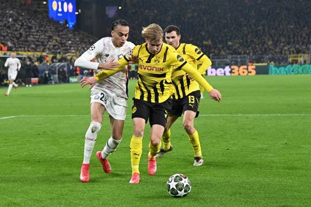 Ethan Mbappe Lille OSC and Daniel Svensson Borussia Dortmund battle for the ball during the UEFA Champions League 2024 25 Round of 16 First Leg match between Borussia Dortmund and LOSC Lille at Signal Iduna Park on March 4, 2025 in Dortmund, Germany Photo by Ralf Treese DeFodi Images