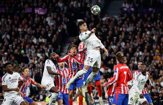 Raul Asencio of Real Madrid Real Madrid v Atletico Madrid , UEFA Champions League, Round of 16, First Leg, Football, Santiago Bernabeu, Madrid, Spain - 04 Mar 2025 EDITORIAL USE ONLY No use with unauthorised audio, video, data, fixture lists, club league logos or live services. Online in-match use limited to 120 images, no video emulation. No use in betting, games or single club league player publications.  Copyright: xRubenxAlbarran Shutterstockx 15178301cl