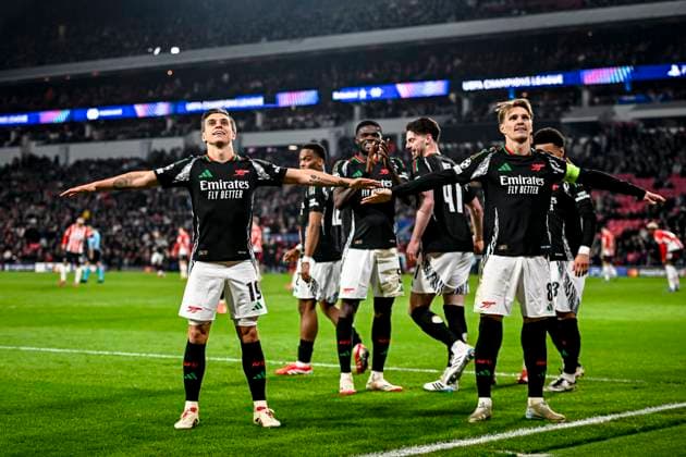 Arsenal midfielder Leandro Trossard, Arsenal midfielder Martin Odegaard celebrating the goal 1 5, during the match PSV Arsenal at the Philips stadium for the UEFA Champions League Round of 16 1st leg season 2024 2025 in EINDHOVEN, Netherlands on 4 march 2025, photo by Stefan Koops EYE4images DeFodi Images